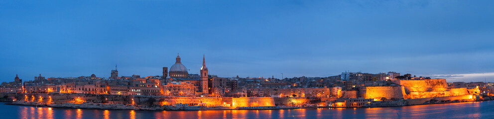 Fototapeta na wymiar Valletta seafront skyline view as seen from Sliema, Malta. Illum