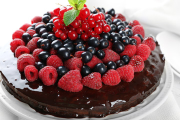 Delicious chocolate cake with summer berries, closeup