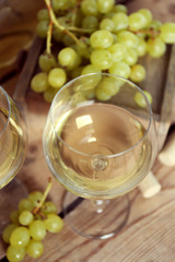 Still life of wine and bread on light background