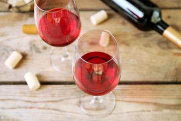 Still life of wine and bread on light background