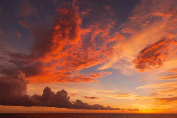 Sunset with clouds of different shapes. Bali, Indonesia, Indian ocean.