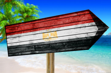Egypt Flag wooden sign on beach background