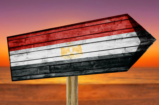 Egypt Flag wooden sign on beach background