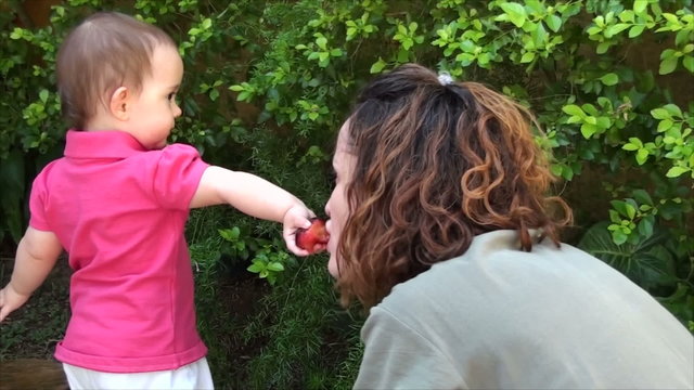 A baby and mom in affection moments