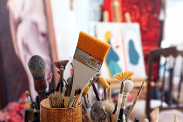 Artist brushes in a studio - 91094635