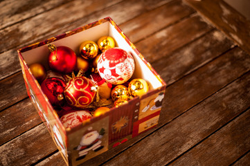 Christmas baubles against a wooden table