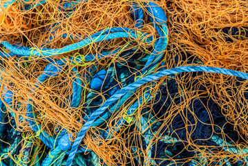 Orange fishing nets in a Greek island