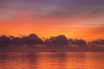 Naklejka na ściany i meble Sunset on Maldives