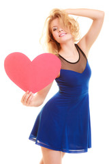 Love symbol. woman holds big red heart