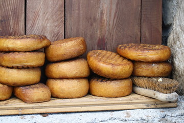 Italy, Trentino. smoked cheese in mountain chalet