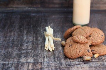 Tasty chocolate chip cookie and sour milk