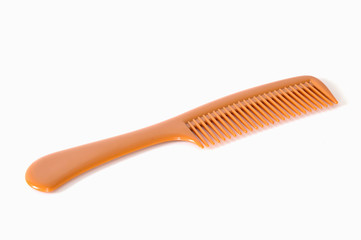 brown plastic comb