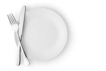 Fork and knife on a empty plate, Isolated on white.