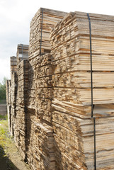 wood, bundles of wooden planks stacked lumber yards