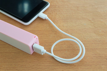 Smartphone charger with powerbank