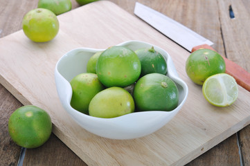 green lime on white dish.