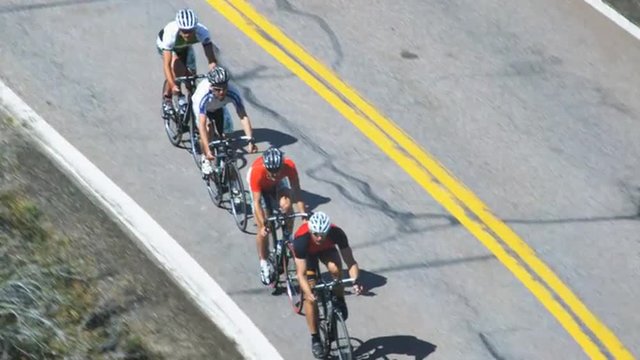 cyclists going downhill