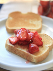 Sweetened strawberries on toast  