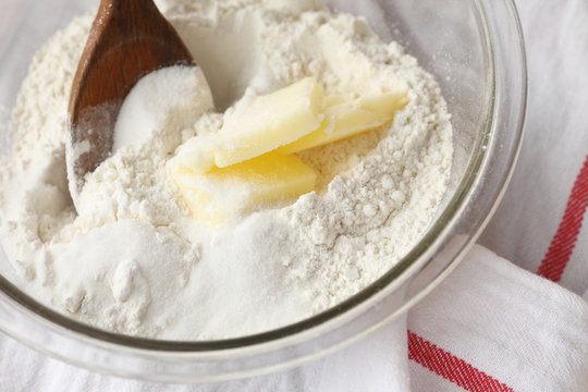Combining butter with flour and sugar  