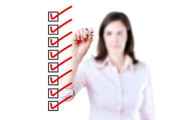 Young business woman checking on checklist boxes, white background.  