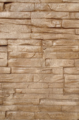 Plaster imitating stone wall closeup