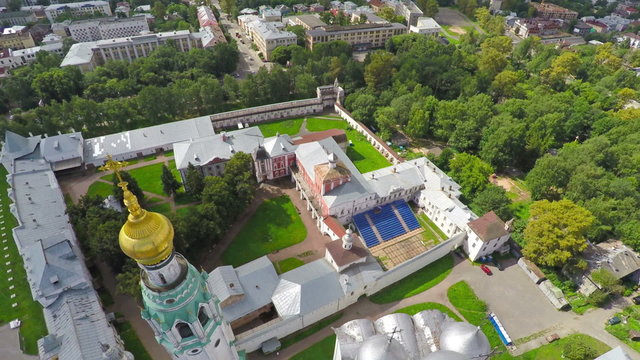 Flying over main square of Vologda city with Kremlin and Cathedral
