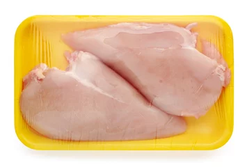 Stof per meter chicken meat package isolated on a white background © Mara Zemgaliete