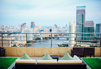 BANGKOK, THAILAND, JULY 25, 2015: Restaurant couch bar with view