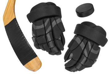 Hockey gloves, stick and puck