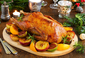 Festive Christmas duck baked with apples and figs.