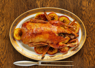 Festive Christmas duck baked with apples and figs.
