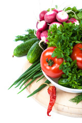 Fresh vegetables on a white background.