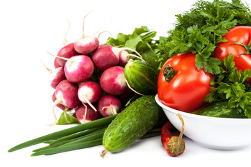 Fresh vegetables on a white background.