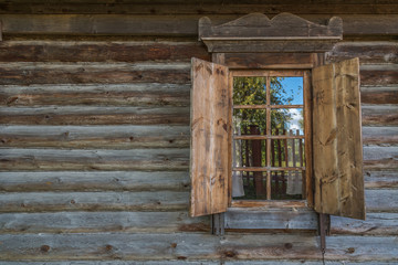 A wooden wall with window