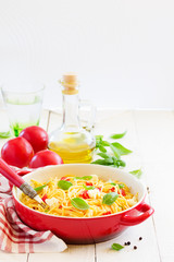 Gluten-free pasta with tomato sauce and cheese.