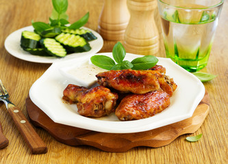 Baked in soy sauce chicken wings.