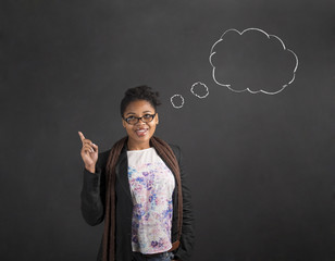 African woman good idea thought clouds on blackboard background