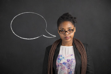 African American woman thinking thought or speech bubble on chalk black board background