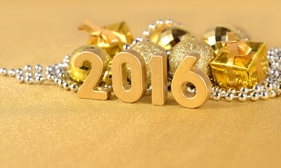 2016 year golden figures and golden Christmas decorations