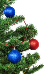 Fototapeta na wymiar Christmas tree decorated with blue and red balls