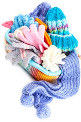 Winter accessory collection. Hat, scarf and mittens in the conta
