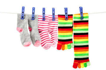 Colored socks clothespins attached to a rope.