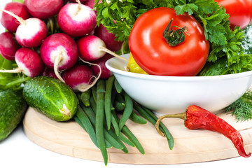 Fresh vegetables on a white background.