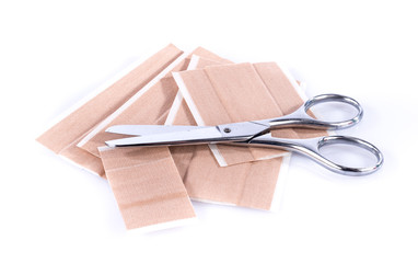 Sticking plaster and scissors