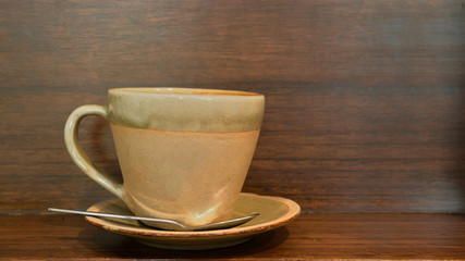 Cappuccino Coffee on Wooden table background