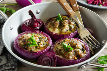 Red onions stuffed with goat cheese and bacon.