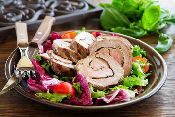 Roast beef with pesto and salad.