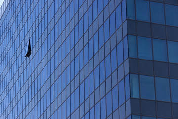 Obraz premium Modern Office Tower with Opened Window