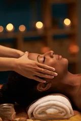 Deurstickers Receiving face massage © DragonImages