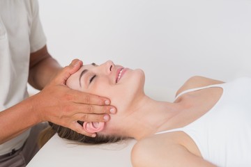 Fototapeta na wymiar Woman receiving neck massage 